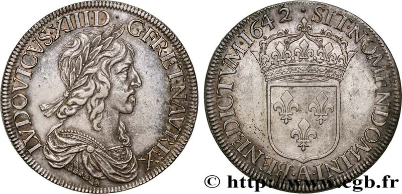 LOUIS XIII
Type : Écu d’argent, 3e type, 2e poinçon de Warin 
Date : 1642 
Mint ...
