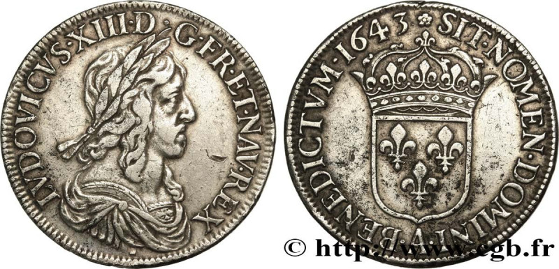 LOUIS XIII
Type : Écu d'argent, 3e type, 2e poinçon de Warin 
Date : 1643 
Mint ...