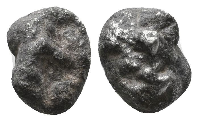 Archaic. Circa 525-475 BC. Cut AR Fragment.

Weight: 6.5 gr
Diameter: 16 mm