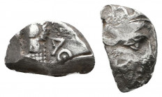 Archaic. Circa 525-475 BC. Cut AR Fragment.

Weight: 7.8 gr
Diameter: 20 mm