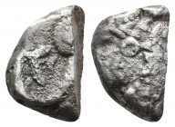 Archaic. Circa 525-475 BC. Cut AR Fragment.

Weight: 9.2 gr
Diameter: 21 mm
