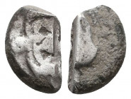 Archaic. Circa 525-475 BC. Cut AR Fragment.

Weight: 4.9 gr
Diameter: 15 mm