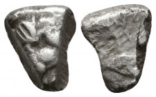 Archaic. Circa 525-475 BC. Cut AR Fragment.

Weight: 2.3 gr
Diameter: 11 mm