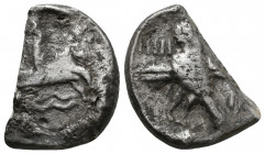 Archaic. Circa 525-475 BC. Cut AR Fragment.

Weight: 5.8 gr
Diameter: 19 mm