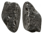 Archaic. Circa 525-475 BC. Cut AR Fragment.

Weight: 2.7 gr
Diameter: 12 mm