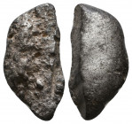 Archaic. Circa 525-475 BC. Cut AR Fragment.

Weight: 4.4 gr
Diameter: 20 mm