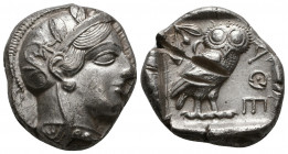 Athens, Attica. AR Tetradrachm, c. 440-420 BC.
Obv. Helmeted head of Athena right.
Rev. Owl standing right, head facing, olive sprig and crescent behi...