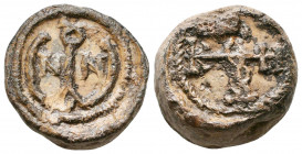 Byzantine Lead Seals, 8th - 13th Centuries

Weight: 14.7 gr
Diameter: 20 mm