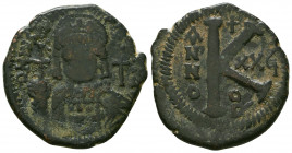 Justinianus I AE Half follis. 527-565 AD.

Weight: 10.1 gr
Diameter: 30 mm