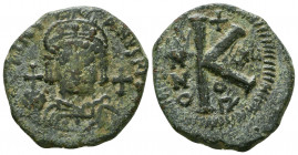 Justinianus I AE Half follis. 527-565 AD.

Weight: 9.2 gr
Diameter: 26 mm