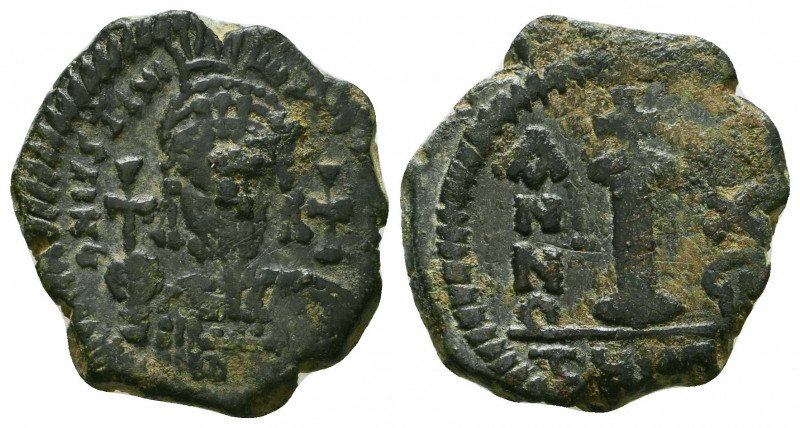 JUSTINIAN I. 527-565 AD. Æ Decanummium. Antioch mint. 

Weight: 5.4 gr
Diameter:...