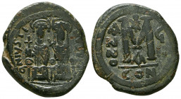 Justin II, with Sophia, 565-578. Follis, Constantinople, 574-575.

Weight: 14.4 gr
Diameter: 32 mm