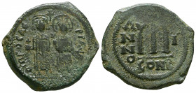 Phocas (602-610 AD). AE Follis, Constantinople.

Weight: 13.3 gr
Diameter: 29 mm