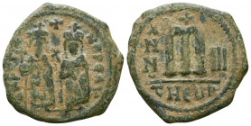 Phocas (602-610 AD). AE Follis, Antioch.

Weight: 10.3 gr
Diameter: 28 mm