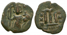 Arab-Byzantine AE Follis.

Weight: 3.0 gr
Diameter: 21 mm