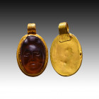 Roman Gold Pendant with Medusa Cameo 
2nd-3rd century AD 

Weight: 4.4 gr
Diameter: 26 mm