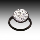 Very Rare Byzantine Silver Ring with inscription on bezel

Weight: 4.9 gr
Diameter: 23 mm