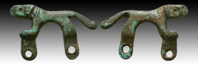 Roman Bronze Strap end as lion shaped - ca. 1st to 3rd century CE

Weight: 10.6 gr
Diameter: 35 mm
