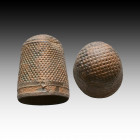Byzantine Bronze Thimble. Ca. 9th - 14th C AD - 

Weight: 4.5 gr
Diameter: 22 mm
