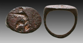 Ancient Bronze Seal ring with running persian on bezel. 1st and 2nd century AD

Weight: 6.2 gr
Diameter: 21 mm