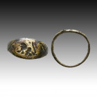 Ancient Roman Bronze Seal ring with lion on bezel. 1st and 2nd century AD

Weight: 2.2 gr
Diameter: 17 mm