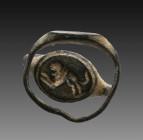 Ancient Roman Bronze Seal ring with lion on bezel. 1st and 2nd century AD

Weight: 1.9 gr
Diameter: 17 mm