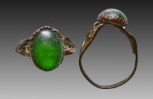 Ancient Bronze Ring with a stone on bezel. 7th and 12th century AD

Weight: 1.8 gr
Diameter: 24 mm