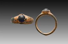 Ancient Bronze Ring with a stone on bezel. 7th and 12th century AD

Weight: 3.3 gr
Diameter: 22 mm