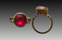 Ancient Bronze Ring with a stone on bezel. 7th and 12th century AD

Weight: 4.6 gr
Diameter: 25 mm