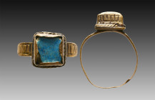 Ancient Bronze Ring with a stone on bezel. 7th and 12th century AD

Weight: 3.6 gr
Diameter: 28 mm