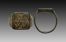 Ancient Bronze Ring with a decoration on bezel. 7th and 12th century AD

Weight: 8.1 gr
Diameter: 22 mm