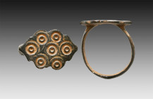 Ancient Bronze Ring with a decoration on bezel. 7th and 12th century AD

Weight: 4.1 gr
Diameter: 22 mm