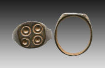 Ancient Bronze Ring with a decoration on bezel. 7th and 12th century AD

Weight: 3.9 gr
Diameter: 20 mm