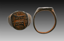 Ancient Bronze Ring with a decoration on bezel. 7th and 12th century AD

Weight: 6.9 gr
Diameter: 22 mm