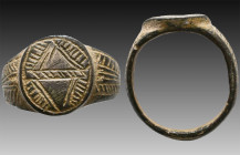 Ancient Bronze Ring with a decoration on bezel. 7th and 12th century AD

Weight: 7.1 gr
Diameter: 22 mm