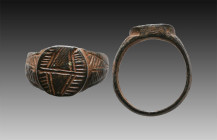 Ancient Bronze Ring with a decoration on bezel. 7th and 12th century AD

Weight: 7.8 gr
Diameter: 24 mm
