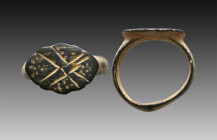 Ancient Bronze Ring with a decoration on bezel. 7th and 12th century AD

Weight: 5.9 gr
Diameter: 22 mm
