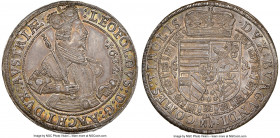 Archduke Leopold Taler 1632 MS62 NGC, Hall mint, KM629.2, Dav-3338. Endowed with a rich and silty tone holding golden accents at the legends. A single...