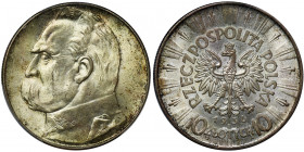 Pilsudski, 10 zloty 1936 - PCGS MS64 Moneta w stanie pełnej menniczej świeżości.&nbsp; Znakomicie zachowane detale, tło z głębokim zegarowym połyskiem...