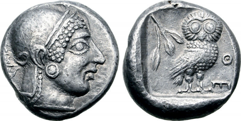 Attica, Athens AR Tetradrachm. Circa 500-480 BC. Archaic head of Athena to right...
