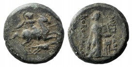 Ionia, Kolophon, c. 285-190 BC. Æ (19mm, 6.87g, 12h). Metrodoros, magistrate. Apollo standing r., holding patera over tripod, and lyre. R/ Horseman ri...