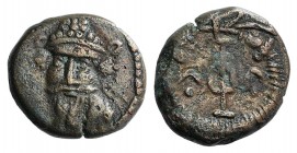 Kings of Elymais. Orodes IV (c. AD 150-200). Æ Drachm (13mm, 3.08g, 1h). Diademed bust facing slightly l. R/ Anchor flanked by crescents with pellets;...