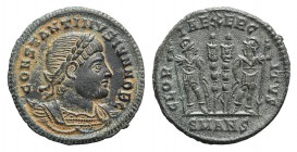 Constantine II (Caesar, 316-337). Æ Follis (17mm, 2.07g, 6h). Antioch, 330-5. Laureate and cuirassed bust r. R/ Two signa between two soldiers, each h...