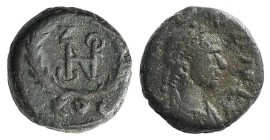 Zeno (474-491). Æ (10mm, 1.36g, 1h). Constantinople. Pearl-diademed and draped bust r. R/ Monogram within wreath; COS. RIC X 961. Good VF