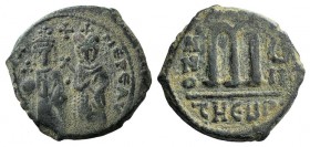 Phocas (602-610). Æ 40 Nummi (27mm, 10.43g, 6h). Theoupolis (Antioch), year 7 (608/9). Phocas and Leontia standing facing, the Emperor holding globus ...