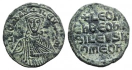 Leo VI (886-912). Æ 40 Nummi (25mm, 5.34g, 6h). Constantinople. Facing bust, wearing crown and chlamys, holding akakia. R/ Legend in four lines across...