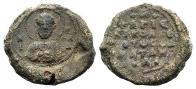 Byzantine PB Seal (26mm, 11.92g, 12h). Nimbate bust of St. Nicholas facing. R/ Legend in five lines. VF