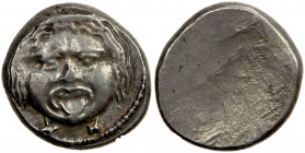ETRURIA: Populonia, AR didrachm (20 asses) (8.33g), 3rd century BC, SNG ANS 77-80, facing head of Metus (or gorgoneion), tongue protruding, hair bound...