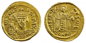 BYZANTINE EMPIRE: Phocas, 602-610, AV solidus (4.34g), Constantinople, SB-618, draped and cuirassed bust facing, wearing crown surmounted by cross, ho...