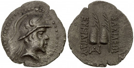 INDO-GREEK: Eukratides, ca. 170-145 BC, AR obol (0.59g), Bop-9C, king's helmeted bust right // the bonnets of the Dioscruri, light porosity, bold VF....